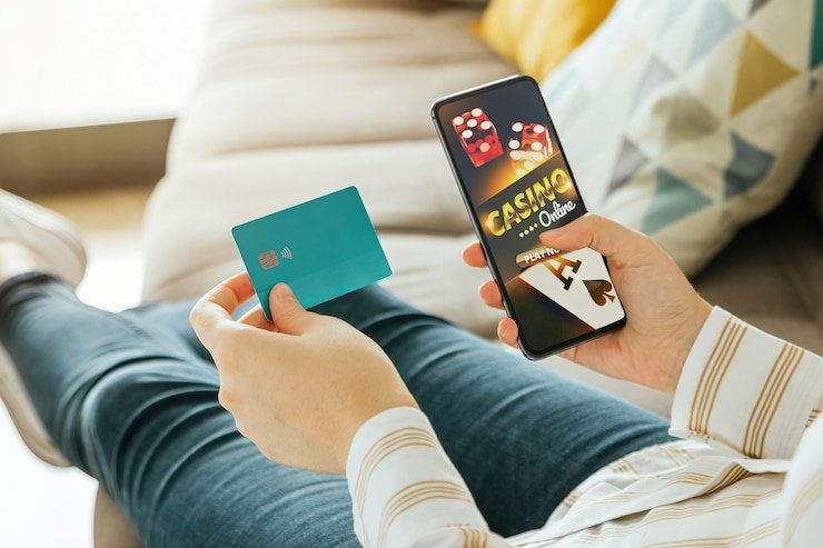 Antarmuka aplikasi mobile redwin69 menampilkan menu taruhan olahraga dan permainan kasino langsung
